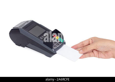 credit card payment concept. close-up hand insert credit card mock up with white blank card with a card swipe machine terminal isolated on white backg Stock Photo