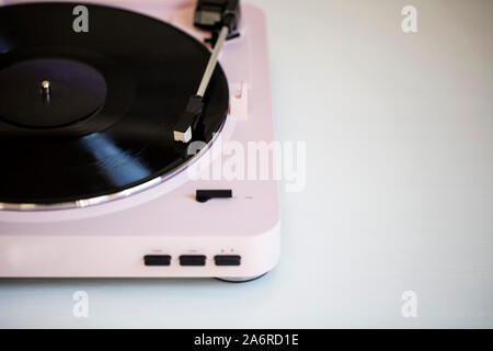 Vintage music record player with a vinyl record Stock Photo