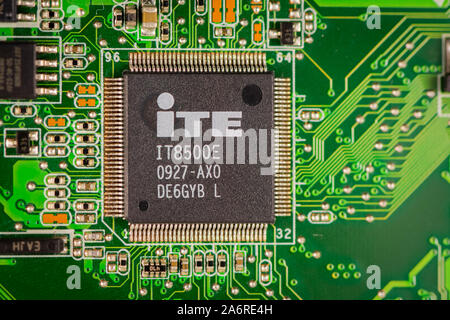 Macro photograph of a green circuit board from old electronic comptuter. Stock Photo