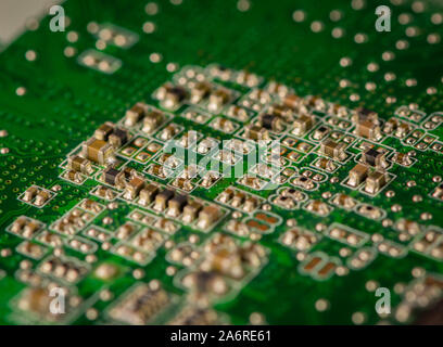 Macro photograph of a green circuit board from old electronic comptuter. Stock Photo