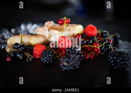 home made forest fruits lemonade with fresh ginger & honey Stock Photo