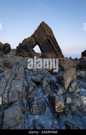 Blackchurch rock in North Devon. A natural stone arch rock formation on mouthmill beach. Stock Photo