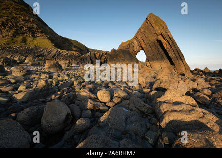 Blackchurch rock in North Devon. A natural stone arch rock formation on mouthmill beach. Stock Photo