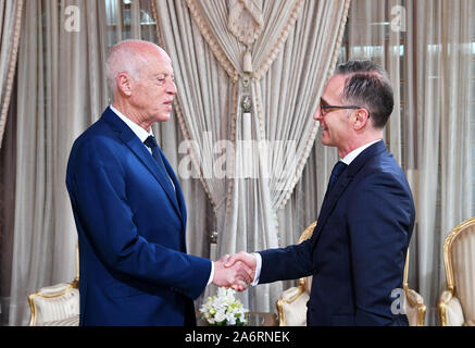 Tunis, Tunisia. 28th Oct, 2019. Tunisian President Kais Saied (L) shakes hands with German Foreign Minister Heiko Maas during their meeting at Carthage Palace. Credit: Khaled Nasraoui/dpa/Alamy Live News Stock Photo