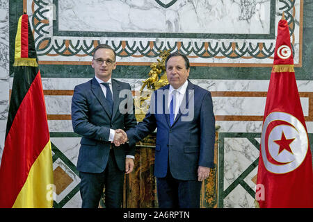 Tunis, Tunisia. 28th Oct, 2019. Tunisian Foreign Minister Khemaies Jhinaoui (R) shakes hands with German Foreign Minister Heiko Maas at the Tunisian Ministry of Foreign Affairs. Credit: Khaled Nasraoui/dpa/Alamy Live News Stock Photo