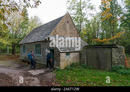 Tyneham, Dorset, UK.  28th October 2019.  UK Weather.  Autumnal view of the old school house at the ghost village of Tyneham in Dorset which is located in the Lulworth Army Range.  The village was evacuated in 1943 for use as a training area ahead of D-Day.  The ruined houses have now been fenced off from the public entering due to the buildings becoming unsafe. Picture Credit: Graham Hunt/Alamy Live News Stock Photo