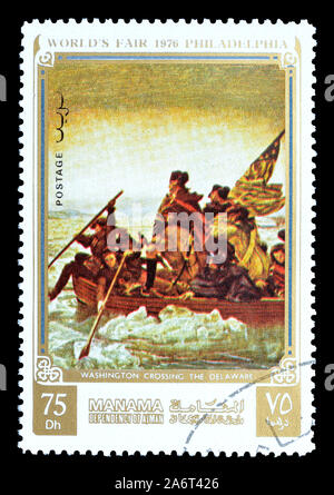 Cancelled postage stamp printed by Manama, that shows George Washington crossing the Delaware, circa 1976. Stock Photo