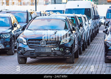 Luxury cars Mercedes-Benz C and E class parkingin a row of car store. Russia. Saint-Petersburg. 28 October 2019 Stock Photo