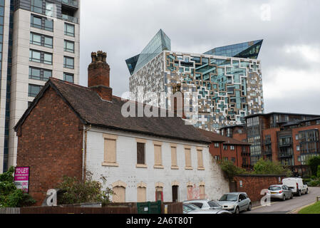 Old part of Birmingham city centre with The Cube in the background. Stock Photo