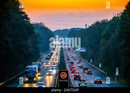Motorway A40, Ruhrschnellweg, near Bochum, Germany, heavy after work traffic, in the evening,  in front of the motorway junction Bochum, A43,  view in