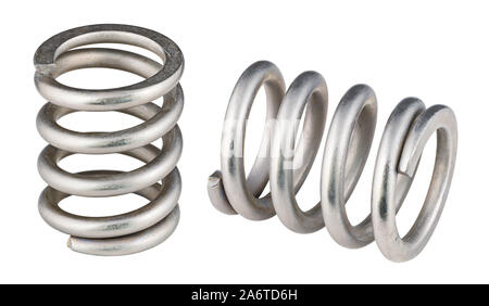 Two steel compression coil springs isolated on white background. Flexible shock absorbers with helical wire winding. Springy machine components detail. Stock Photo