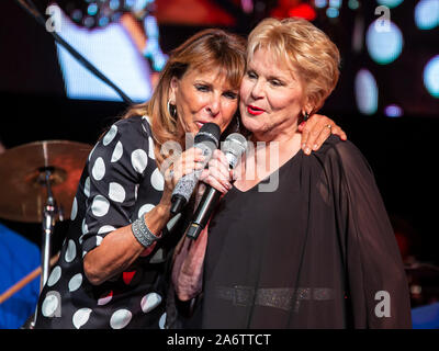 German-British pop singer Ireen Sheer ('Goodbye Mama') and American pop singer Peggy March ('I will follow him') are performing at Schlager music show Schlagerlegenden, with schlager music stars of the 1960s and 1970s Ireen Sheer, Peggy March, Lena Valaitis, Graham Bonney, Michael Holm and Orchester Otti Bauer. At Stadthalle Wetzlar, Wetzlar, Germany, 27th Oct, 2019. Credit: Christian Lademann Stock Photo