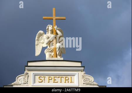 St. Petersburg, Russia - July 10, 2019: Statue of angel on the top of Lutheran Church of Saint Peter and Saint Paul. Stock Photo