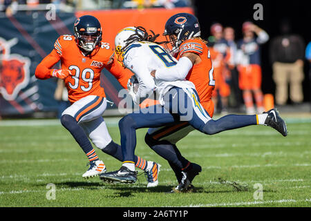 Chicago, Illinois, USA. 27th Oct, 2019. - Bears #39 Eddie Jackson and #24 Buster Skrine tackle Chargers #81 Mike Williams during the NFL Game between the Los Angeles Chargers and Chicago Bears at Soldier Field in Chicago, IL. Photographer: Mike Wulf. Credit: csm/Alamy Live News Stock Photo