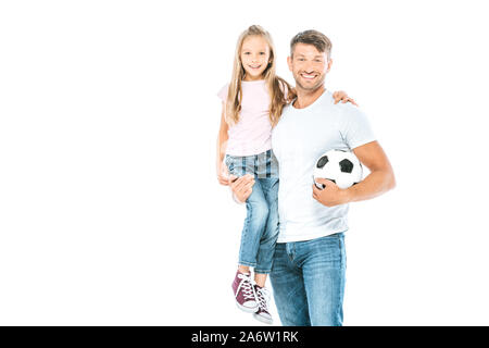 happy father holding in arms daughter and standing with ball isolated on white Stock Photo