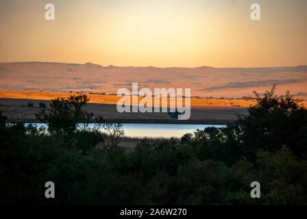 Sunrise over the hills near eManzana in Mpumalanga Province, South Africa Stock Photo