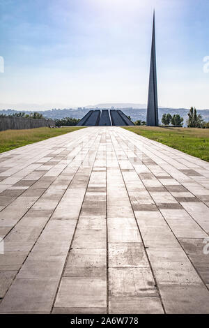 Yerevan, Yerevan Province, Armenia. The Memorial Hall and Memorial Column (The Reborn Armenia) at the Tsitsernakaberd Armenian Genocide Memorial Compl Stock Photo