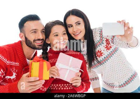 happy family with presents taking selfie isolated on white Stock Photo