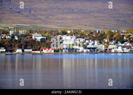 Akureyri, Iceland. A view of Akureyri and its harbor, in Northern Iceland from across the  the fjord Eyjafjordur (Eyjafjörður). Stock Photo