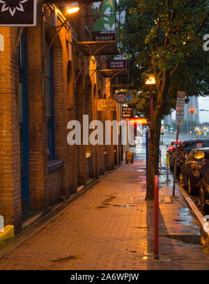 Rainy sidewalks outside Market Square in Victoria, BC, Canada. Stock Photo