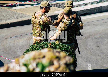 Rome Italy September 29, 2019 View of an Italian soldier on protection mission of the Coliseum of Rome in the morning Stock Photo