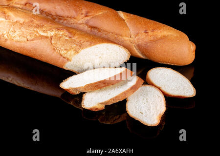 Whole and Sliced Baked Fresh French Baguette Bread Stock Photo