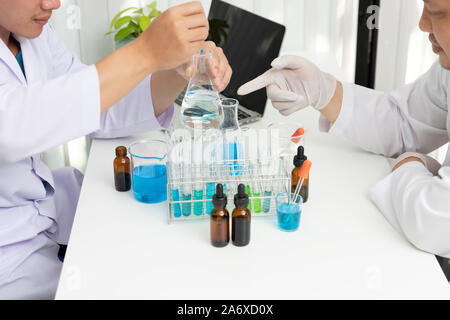 Research and development concept, Laboratory scientist working at lab with test tubes about medicine Stock Photo