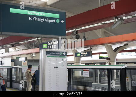 Tanah Merah MRT station, Singapore. Signboard to Changi Airport. Stock Photo