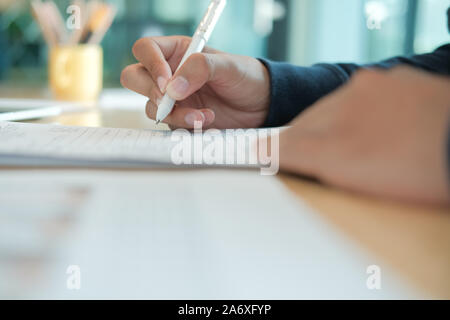 candidate applicant fill out application form. man signing contract agreement. employment recruitment concept Stock Photo