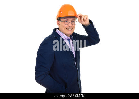 man in a construction orange helmet Stock Photo