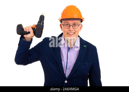 man in a construction helmet and a drill Stock Photo