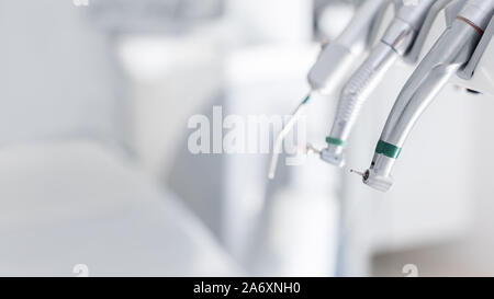 Different dental instruments and tools in dentist office Stock Photo