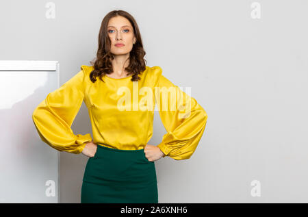 strict teacher girl at the whiteboard Stock Photo
