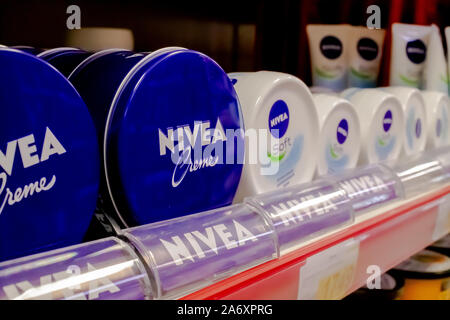 Nivea cosmetic products for sale on a supermarket shelf. The Nivea brand for skin and body care belongs to the German company Beiersdorf. Stock Photo