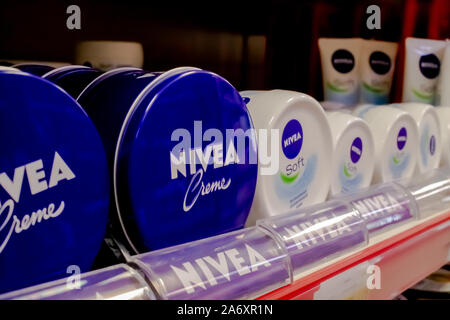 Nivea cosmetic products for sale on a supermarket shelf. The Nivea brand for skin and body care belongs to the German company Beiersdorf. Stock Photo