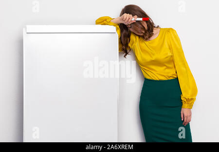 girl teacher sleeping in the classroom Stock Photo