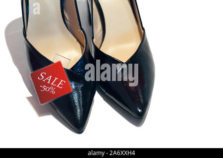 Sale sign and collection of stylish women's clothes in fashion store Stock  Photo - Alamy