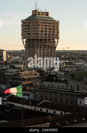 Milan, Italy: Urban landscape at sunset. Milan skyline with Velasca Tower (Torre Velasca). This famous skyscraper was built in the fifties. Stock Photo