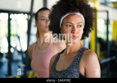 Portrait of young african fitness woman in gym Stock Photo