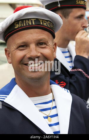 Smiling participant in Les Bravades festival parade in the port of St Tropez, France Stock Photo