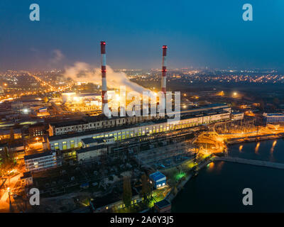 Thermal power plant at night. Aerial view from drone of large industrial area. Stock Photo