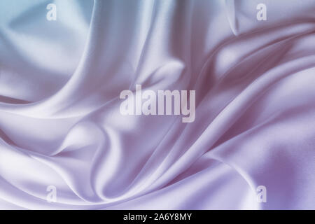 Elegant satin silk with waves, texture background Stock Photo