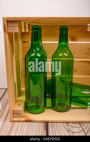 large antique glass bottle with light green liquid as medicine and herbal  mixture Stock Photo - Alamy