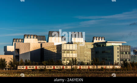 Cambridge Biomedical Campus - MRC Molecular Biology Lab. A London to Cambridge Train  passes the MRC Laboratory of Molecular Biology, Stock Photo