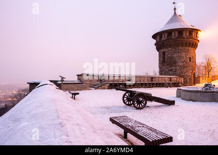 Views of Chateau's terrace and restaurant with historic cannons. Wernigerode in Winter, at night and in the snow Stock Photo