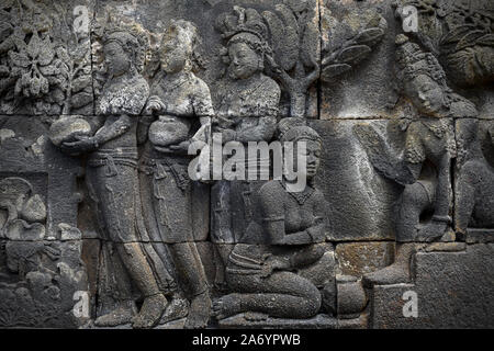 The bas-relief at Borobudur temple in Central Java province, Indonesia. Stock Photo