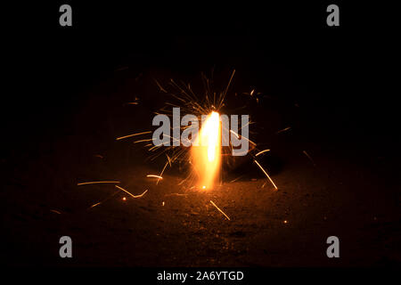 Burning sparkler Happy Diwali with lamp.. Stock Photo