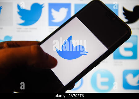 In this photo illustration a Twitter logo displayed on a smartphone. Stock Photo