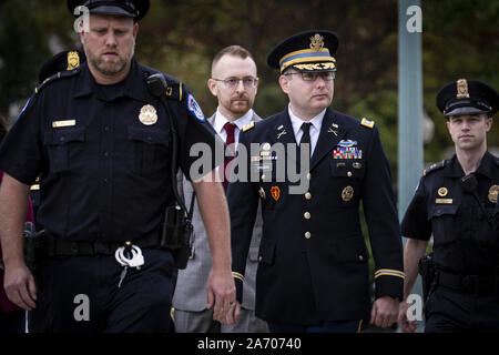 Washington, United States. 29th Oct, 2019. National Security Council Ukraine expert, Lt. Col. Alexander Vindman USA (center), arrives for a closed door meeting with the House Intelligence, Foreign Affairs and Oversight committees on Capitol Hill on October 29, 2019 in Washington, DC. The committees are interviewing witnesses as part of the ongoing impeachment inquiry against President Donald Trump. Photo by Pete Marovich/UPI Credit: UPI/Alamy Live News Stock Photo
