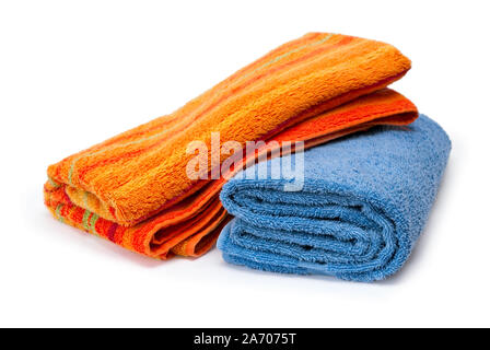 Two towels rolled up on a white background Stock Photo